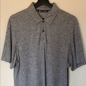 Travis Mathew slim fit men’s polo. Size: M